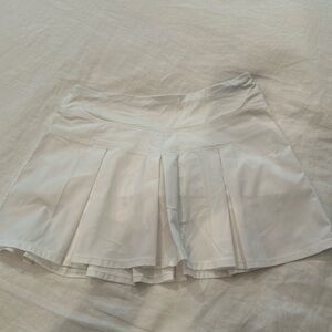 Ivivva tennis skirt. White. Size 14. Never worn. Girls.